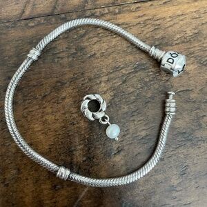Pandora authentic bracelet and charm!